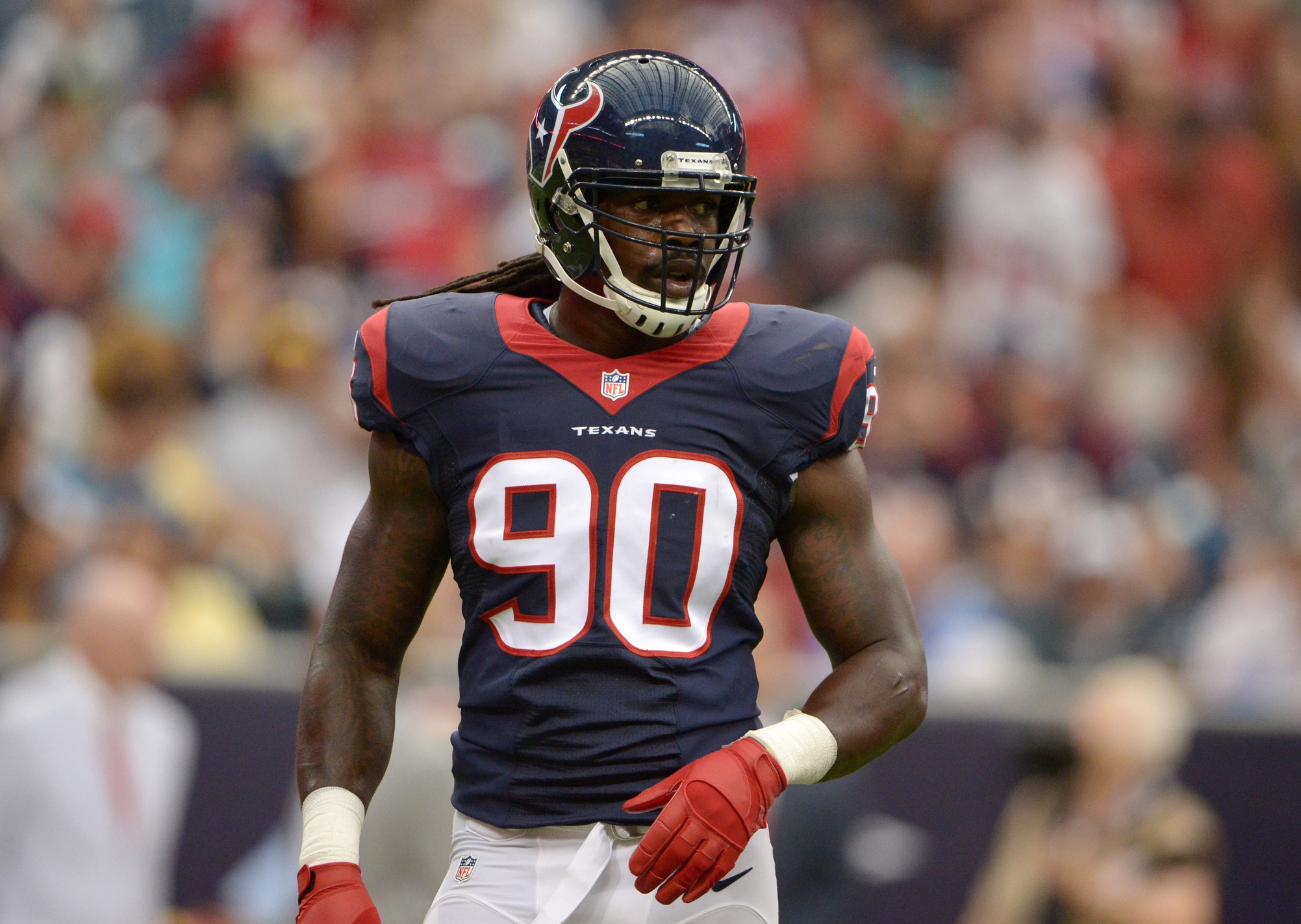 Houston Texans linebackers Jadeveon Clowney, left, and Whitney