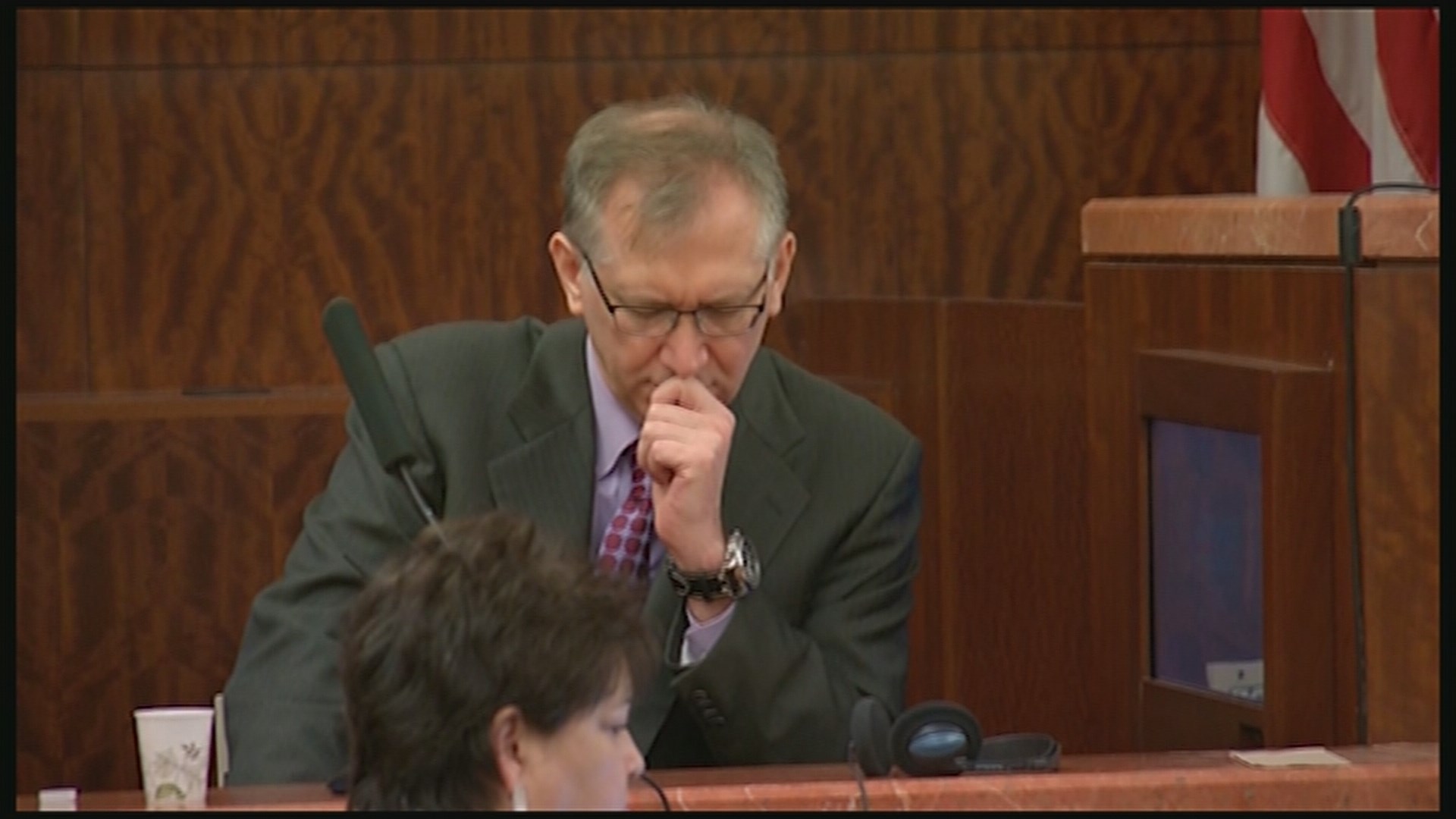 Secretly recorded phone calls played in cancer doctor's assault trial