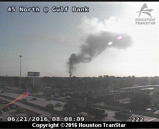 Scrap yard fire sends plume of smoke into sky over N. Houston | khou.com