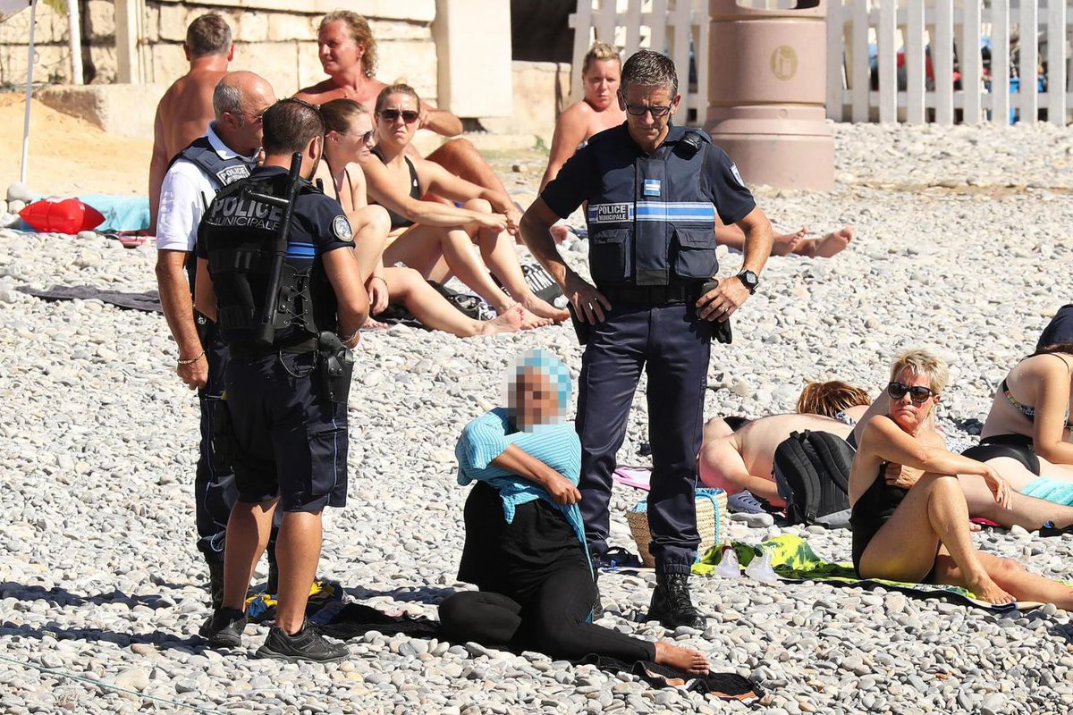 Nude Beach Porn Captions - Burkini-clad woman forced to disrobe on French beach | king5.com