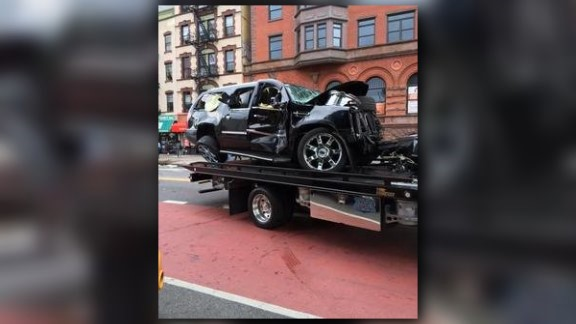 12 injured after SUV strikes city bus, jumps curb in New York City ...
