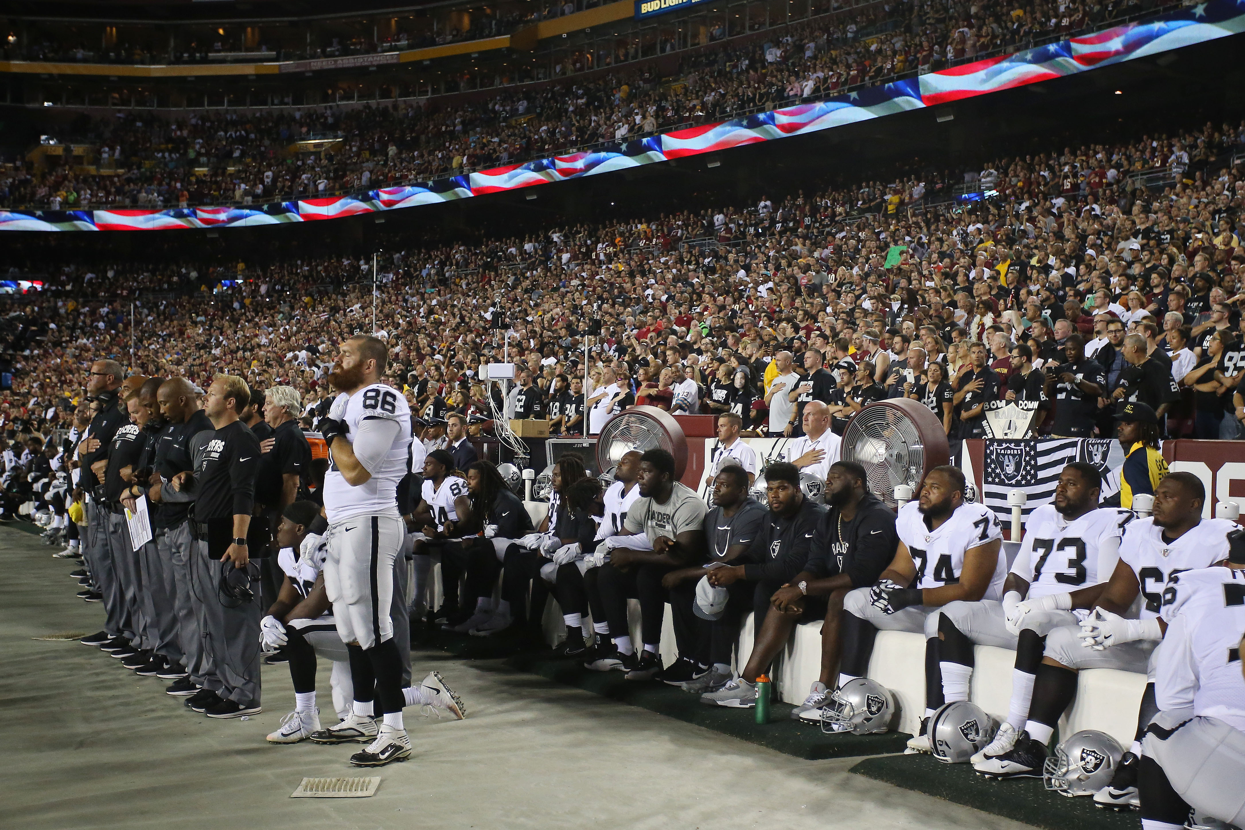 Tampa Bay's Mike Evans sits for anthem to protest Donald Trump