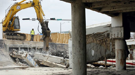 Demolition under way on ramp to Galveston's Ike-battered Flagship Hotel ...