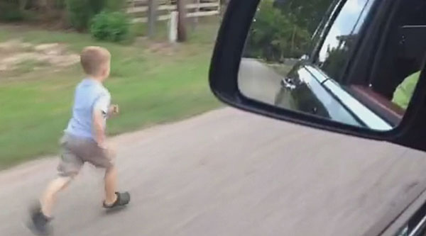 Dad defends viral video of his 4-year-old son running beside his SUV ...