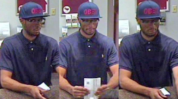 Buttoned-up bandit robs Cypress bank, threatens weapon | khou.com