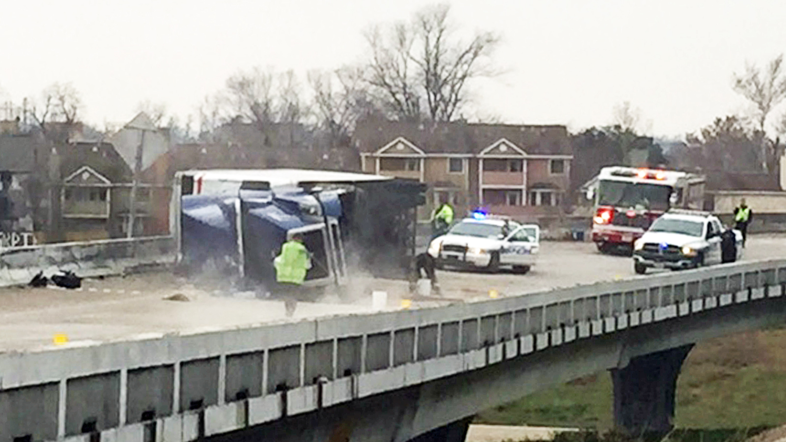 Overturned truck, spilled battery acid shut down I-10 ramp | khou.com